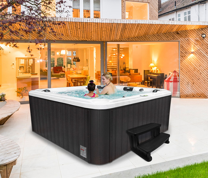 Hot Tubs, Spas, Portable Spas, for sale Geo Spas GEO Spas hot tub being used in a family setting